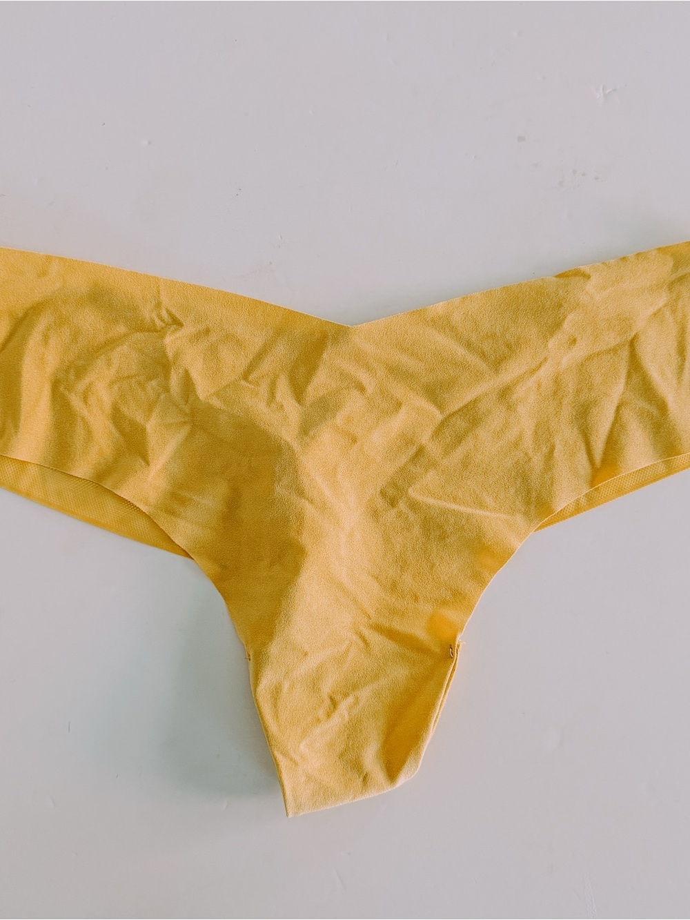 Victoria’s Secret Mustard Yellow Seamless Thong. Size Large.